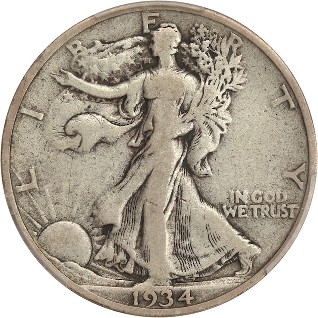 1934 Walking Liberty Half Dollar struck-through grease error showing missing design detail in flat voided area
