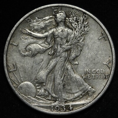 1934 Walking Liberty Half Dollar off-center strike error showing design shifted with blank planchet region visible and date still readable